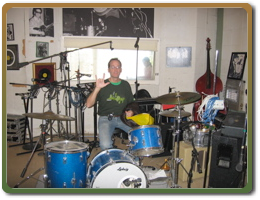Tim Kuchta behind drum set
